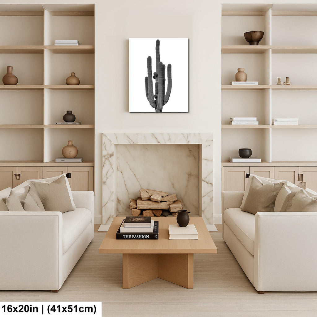 Living room with beige walls, white shelves, and a fireplace with a cactus wall art print above.