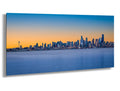 Seattle skyline at sunrise over Elliott Bay with Space Needle, smooth blue water