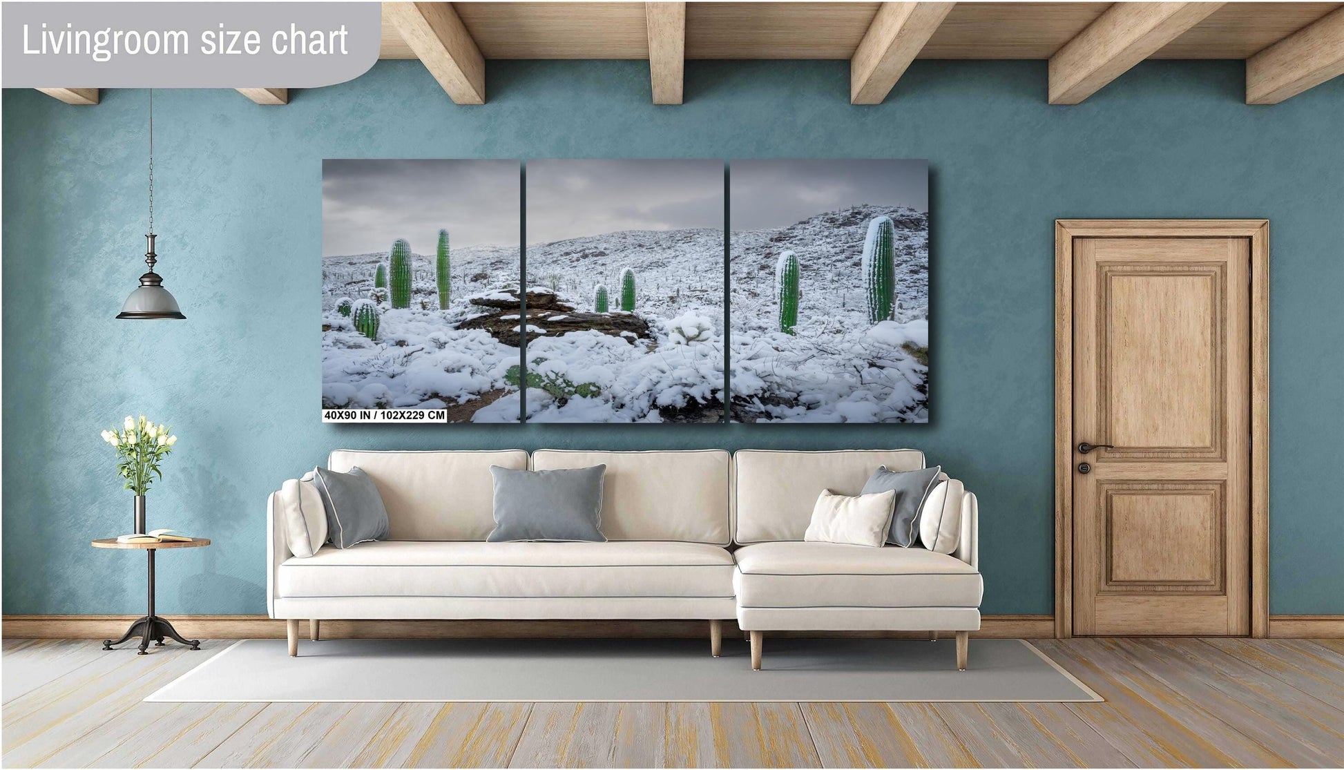 Snow-covered saguaro cacti in Arizona's desert, showcasing a rare winter scene with mountains in the background.