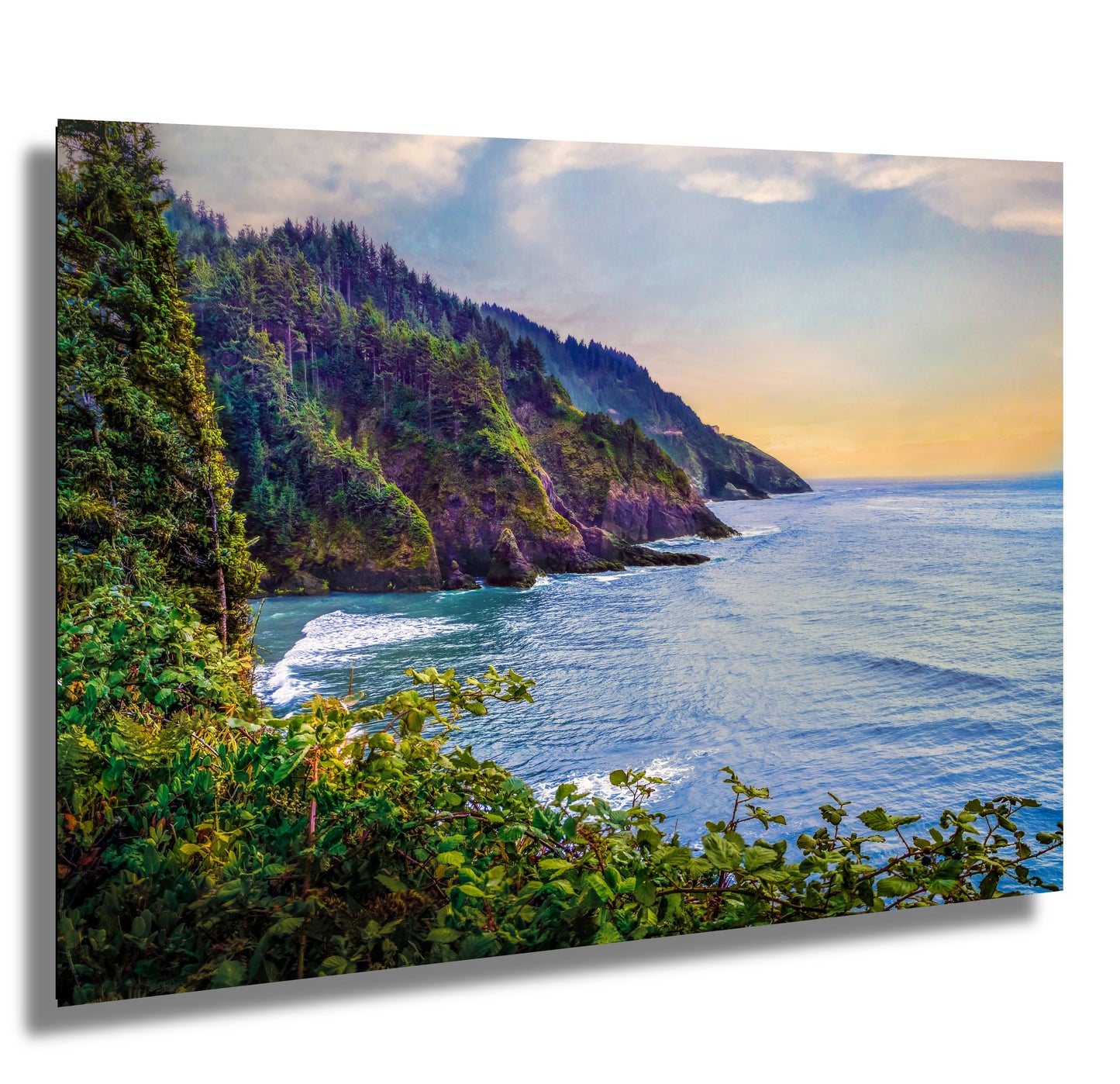 Scenic view of Rocky Oregon Coast landscape with trees and ocean.