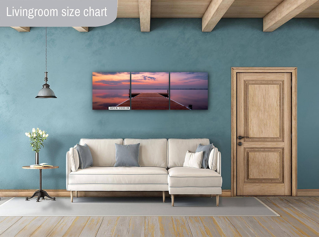 Sunset over calm Lake Bemidji with dock view and pastel skies before a summer storm 3-panel wall art hanging in living room.