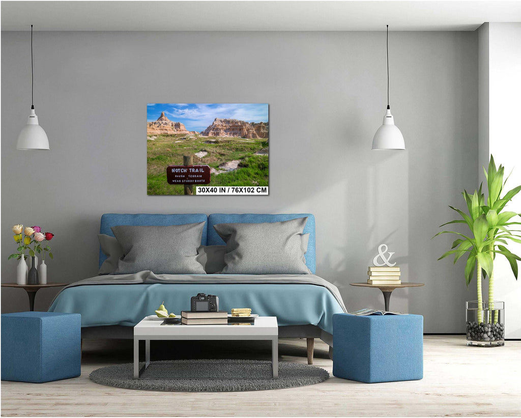 Modern living room with a blue sofa, coffee table, and decorative items.
