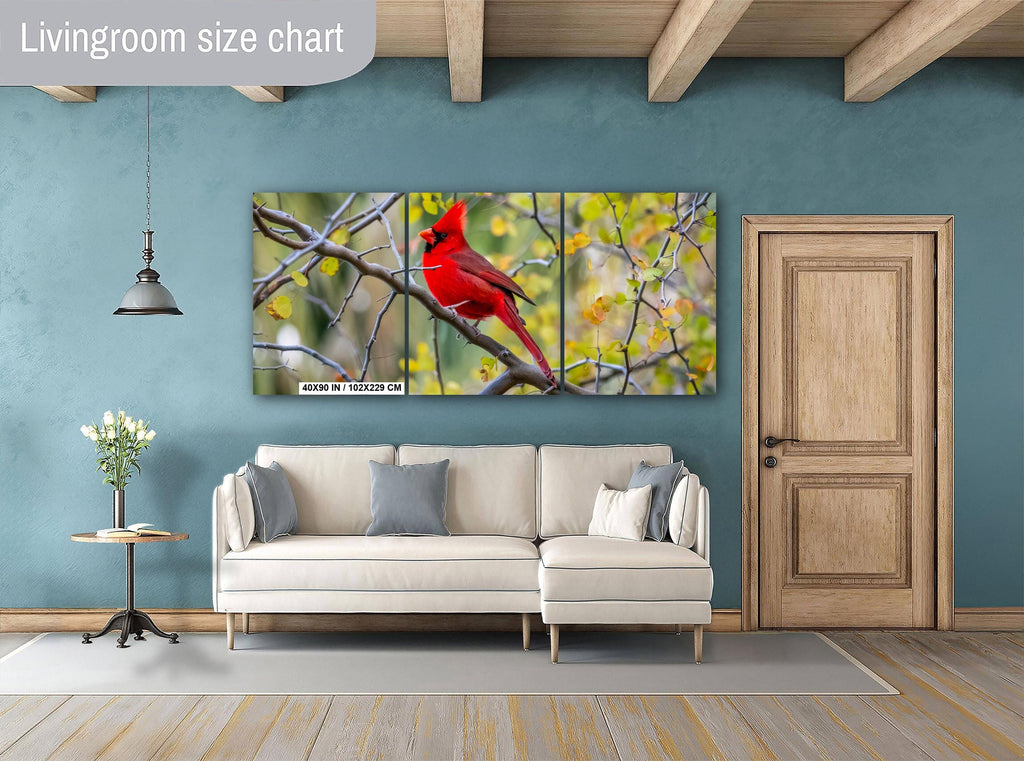Living room with a large wall art of a red cardinal bird, beige sofa, and wooden door.
