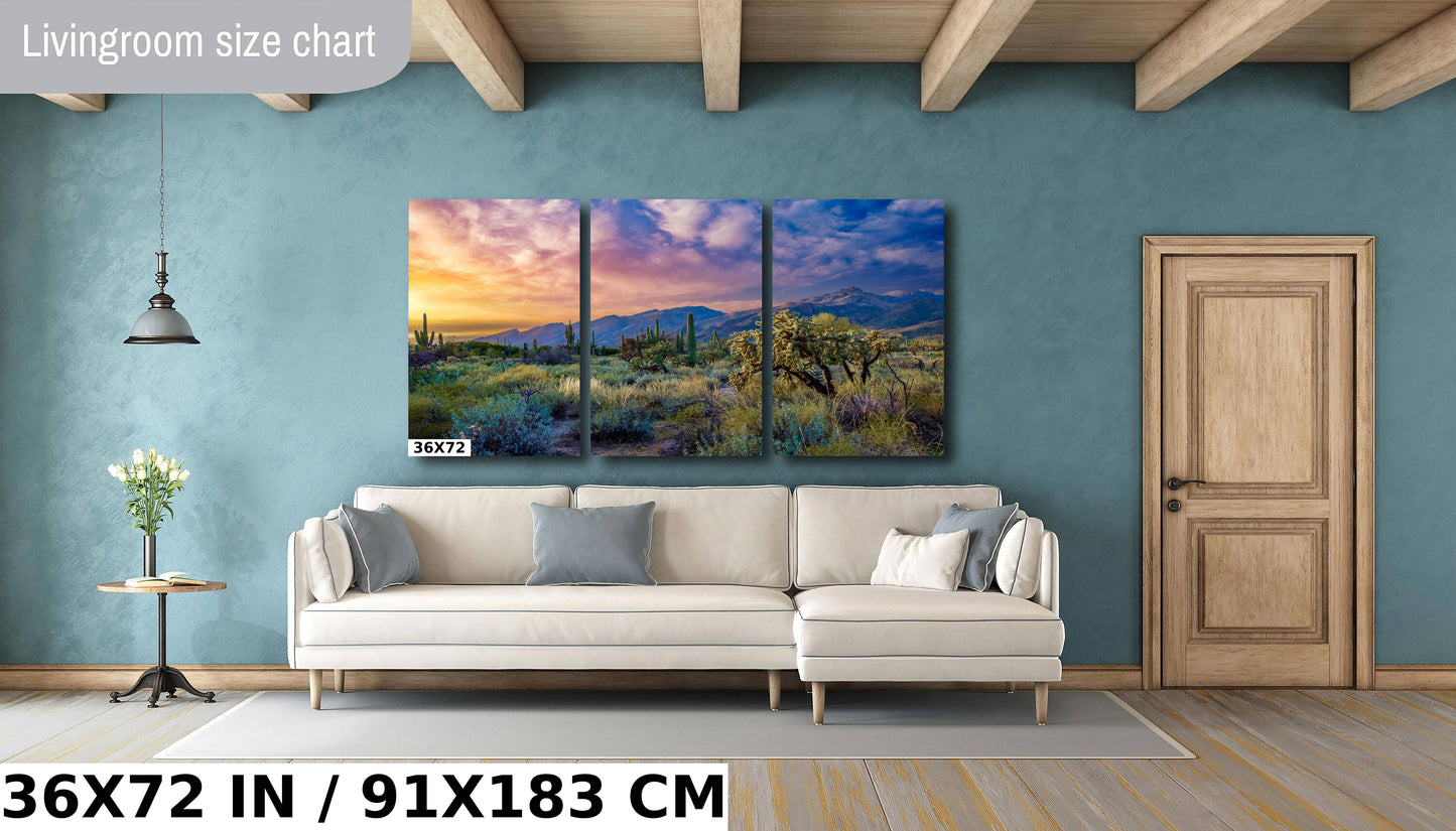 a living room with a couch and a painting on the wall