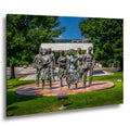 Little Rock Nine Civil Rights Memorial bronze sculpture in Little Rock, Arkansas under bright sunlight
