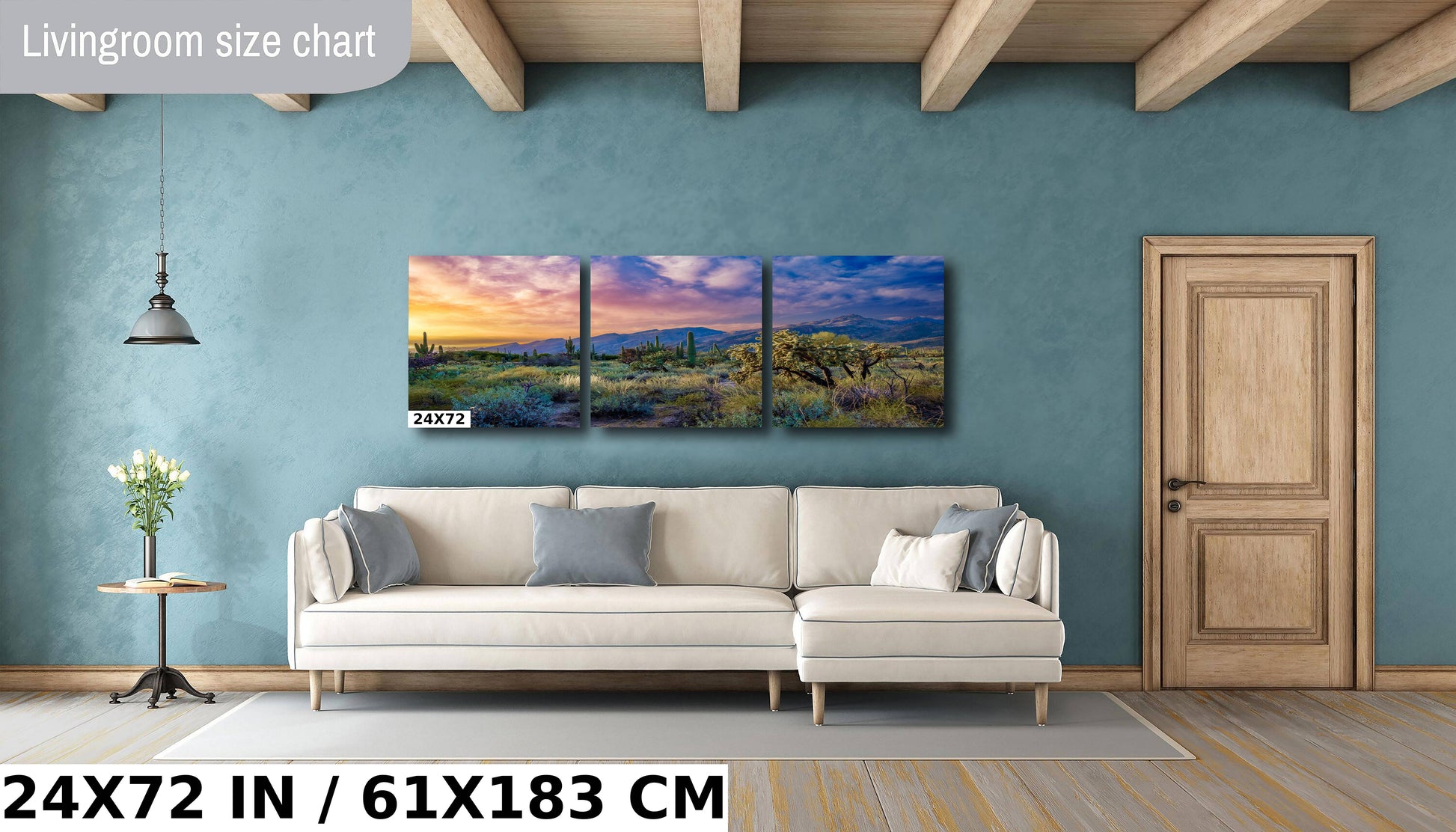 a living room with a couch and a painting on the wall