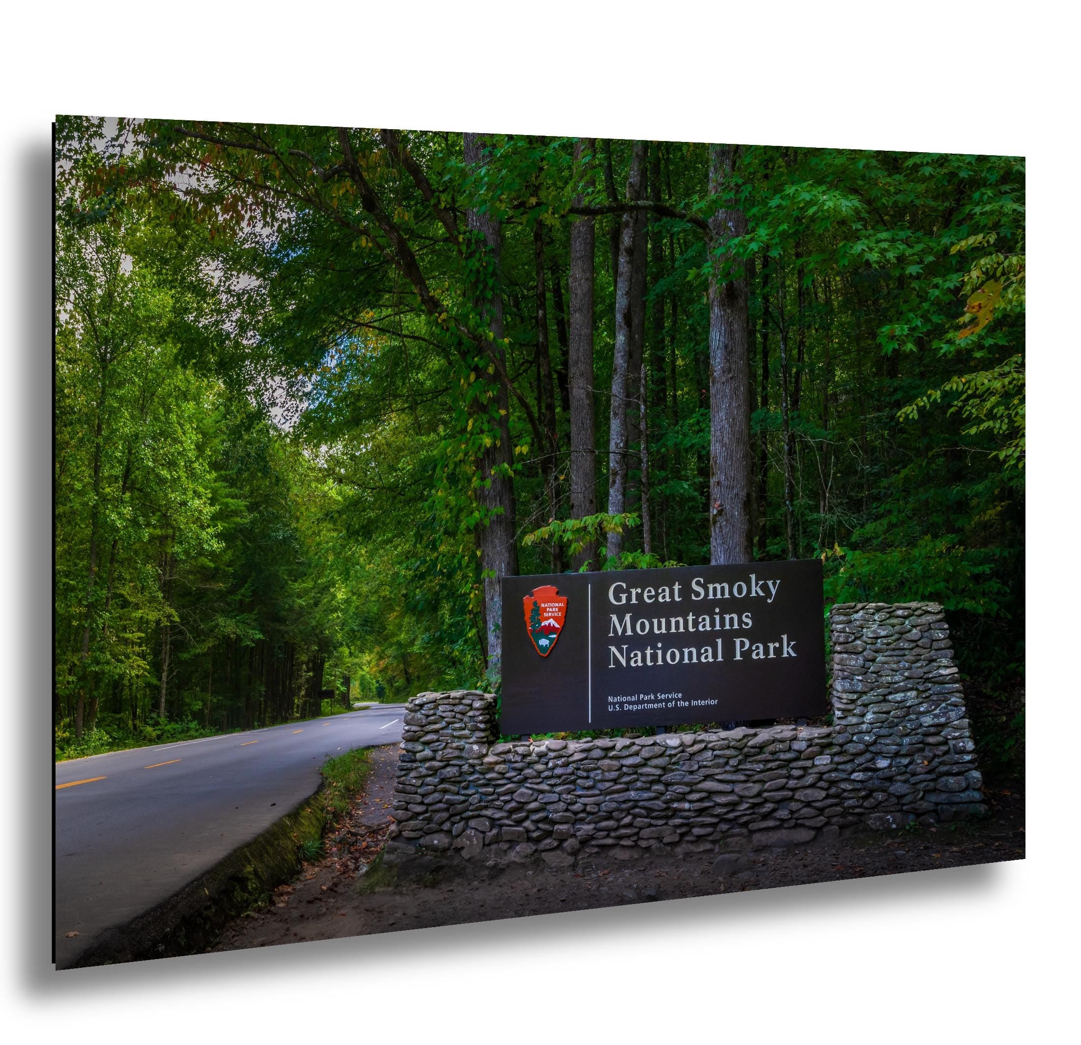 Great Smoky Mountains National Park sign in a forest setting