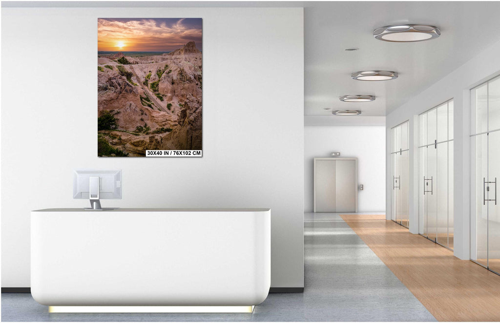Modern office interior with a scenic wall art print.