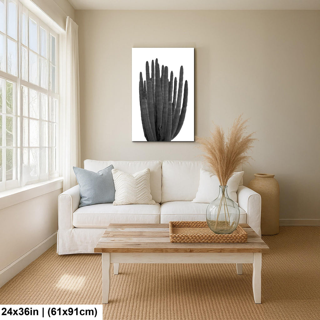 Living room with a white sofa, wooden coffee table, and wall art.