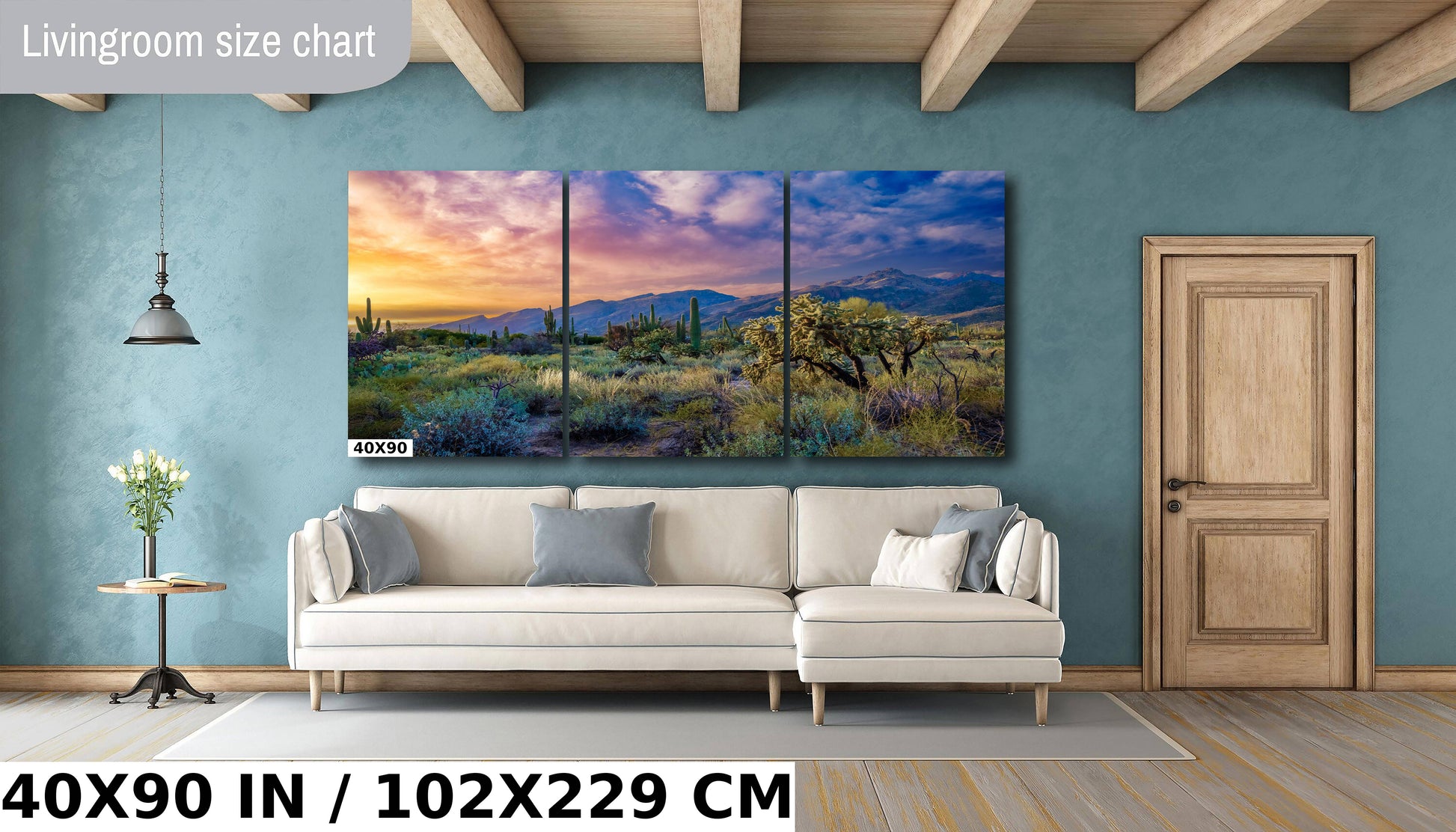 a living room with a couch and a painting on the wall