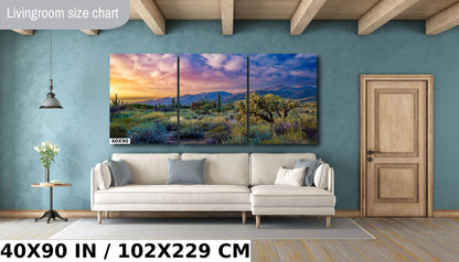 a living room with a couch and a painting on the wall