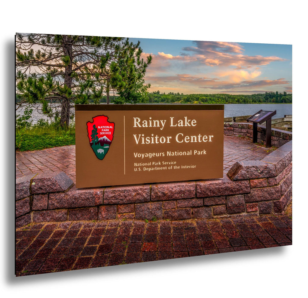 Rainy Lake Visitor Center sign at sunset in Voyageurs National Park, Minnesota.