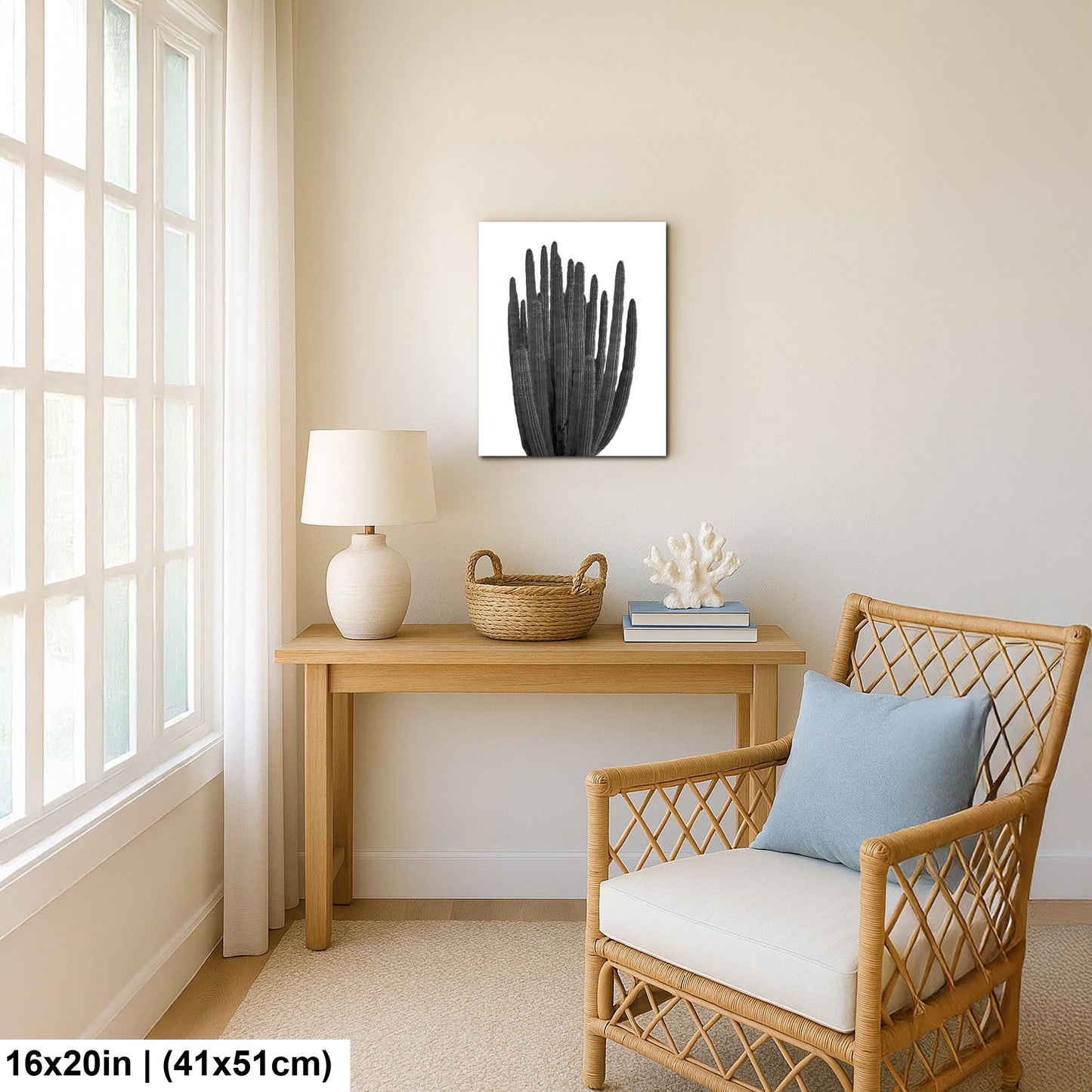 Nautical-themed room with a wooden table, lamp, and chair against a beige wall.