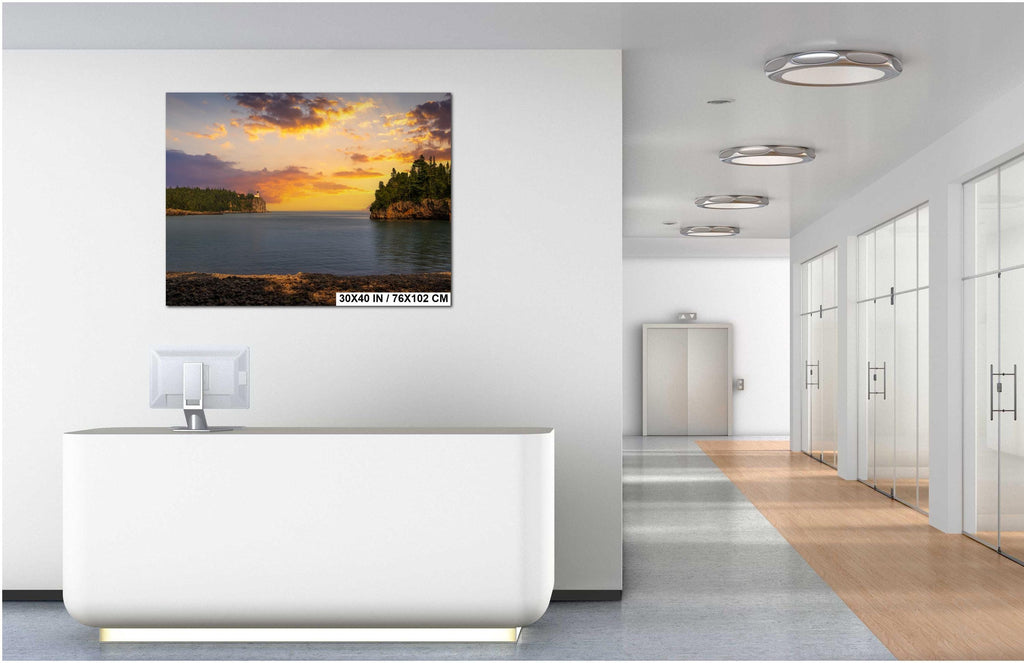Modern office interior with a large TV screen displaying a scenic image.