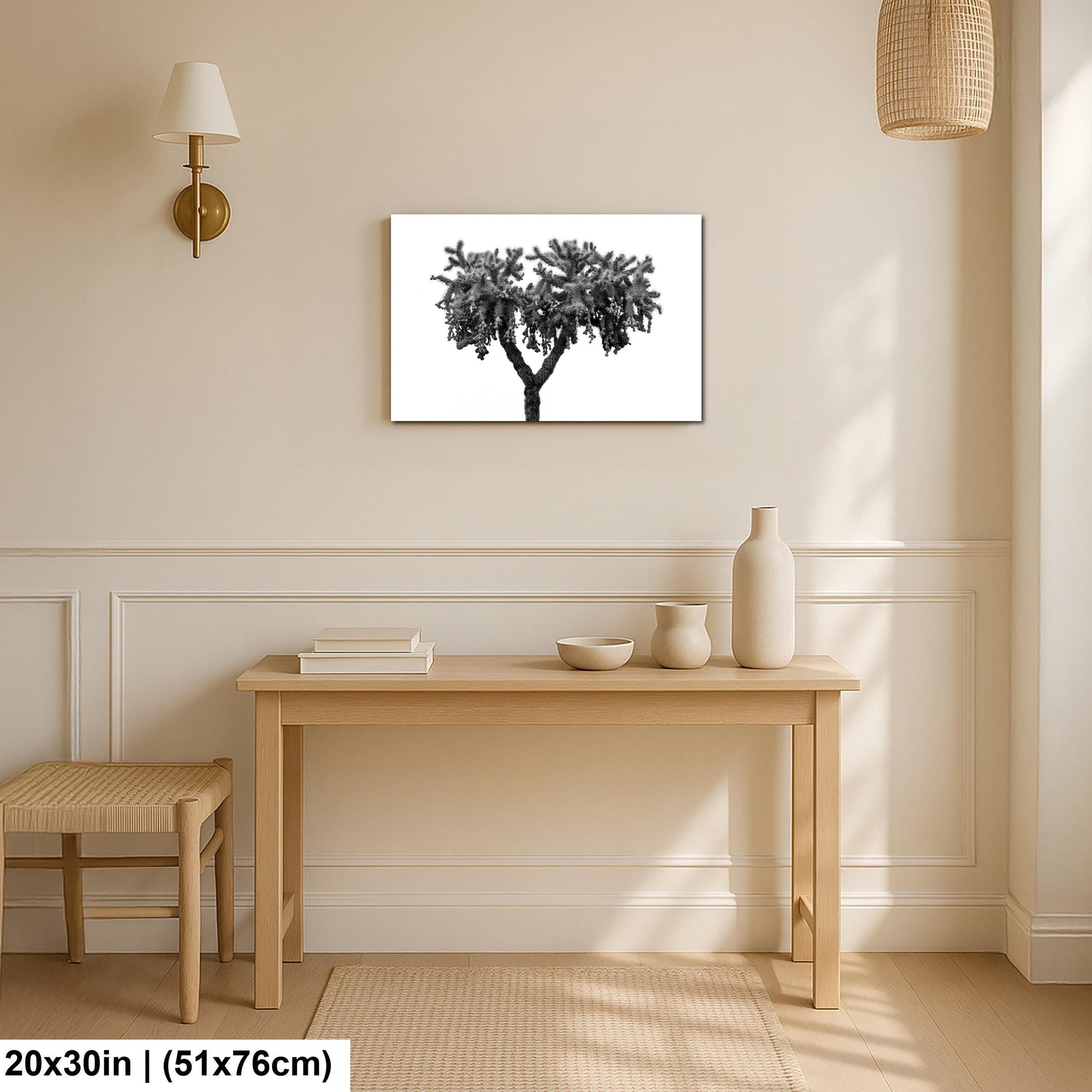 Room interior with a table, stool, and wall art on a beige wall.