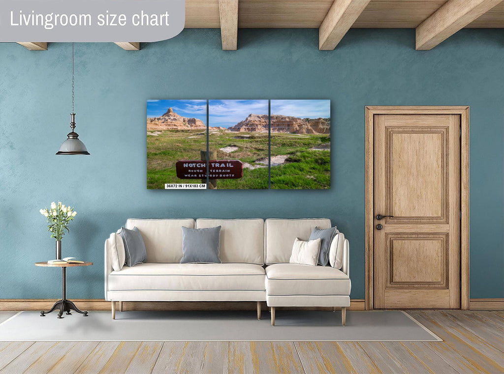 Living room with a large wall art piece depicting a scenic landscape.