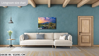 a living room with a couch and a painting on the wall