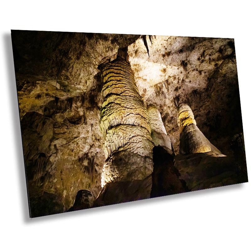 A wall art print featuring the interior of Carlsbad Caverns National Park, showcasing the giant dome and twin domes with a dramatic lighting effect.